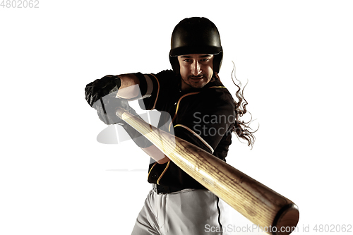 Image of Baseball player, pitcher in a black uniform practicing on a white background.