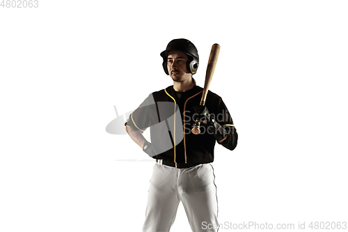 Image of Baseball player, pitcher in a black uniform practicing on a white background.