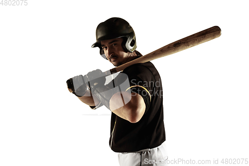 Image of Baseball player, pitcher in a black uniform practicing on a white background.