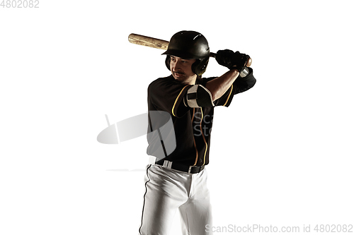 Image of Baseball player, pitcher in a black uniform practicing on a white background.