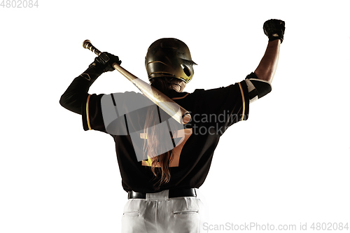 Image of Baseball player, pitcher in a black uniform practicing on a white background.