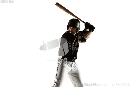 Image of Baseball player, pitcher in a black uniform practicing on a white background.