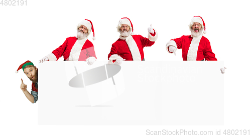 Image of Emotional Santa Claus greeting with New Year and Christmas, copyspace