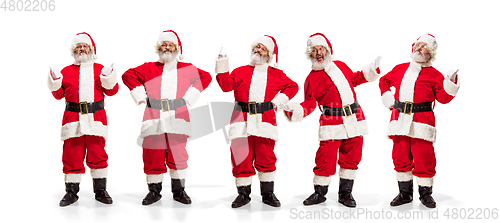 Image of Emotional Santa Claus greeting with New Year and Christmas, copyspace