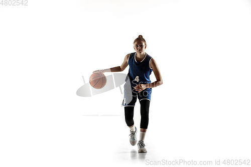 Image of Young caucasian female basketball player against white studio background