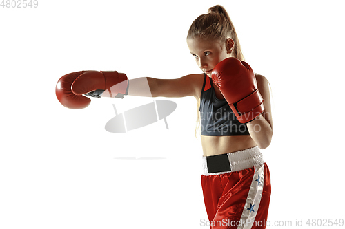 Image of Young female kickboxing fighter training isolated on white background