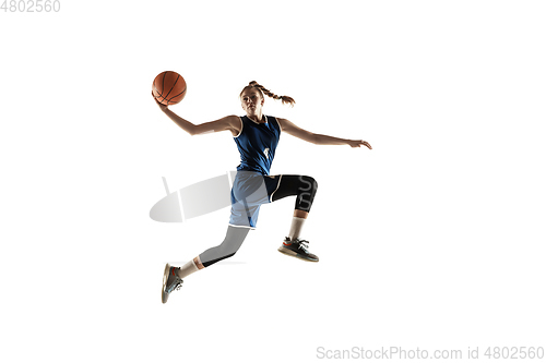 Image of Young caucasian female basketball player against white studio background