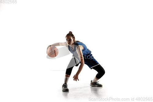 Image of Young caucasian female basketball player against white studio background