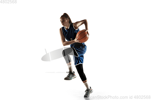 Image of Young caucasian female basketball player against white studio background