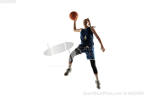Image of Young caucasian female basketball player against white studio background
