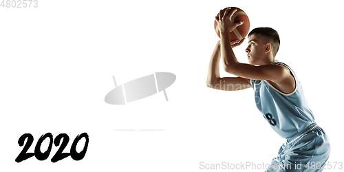 Image of Full length portrait of a young basketball player with ball