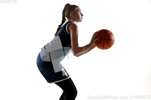 Image of Young caucasian female basketball player against white studio background