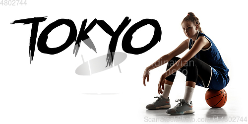 Image of Young caucasian female basketball player on white studio background, Tokyo