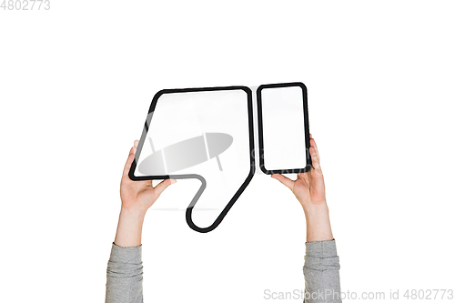Image of Hands holding the sign of dislike on white studio background