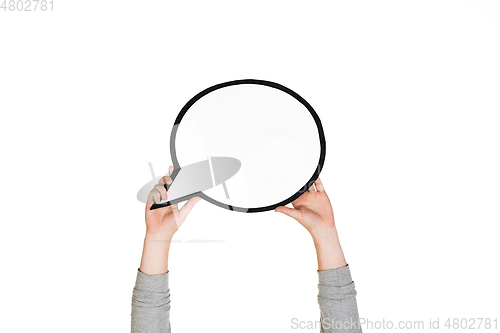 Image of Hands holding the sign of comment on white studio background