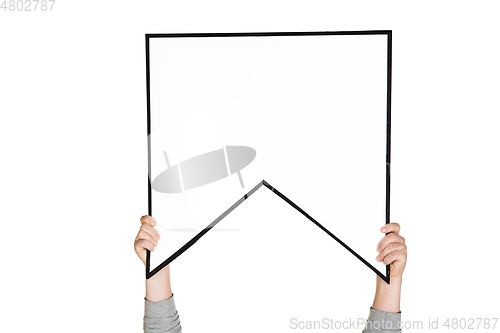 Image of Hands holding the sign of bookmark on white studio background
