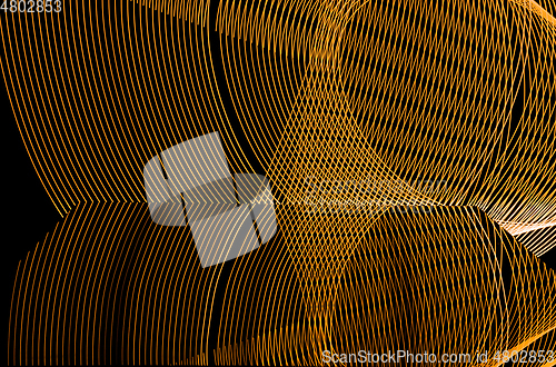 Image of Bright neon line designed background, shot with long exposure, yellow gold