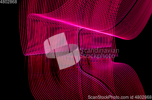 Image of Bright neon line designed background, shot with long exposure, pink