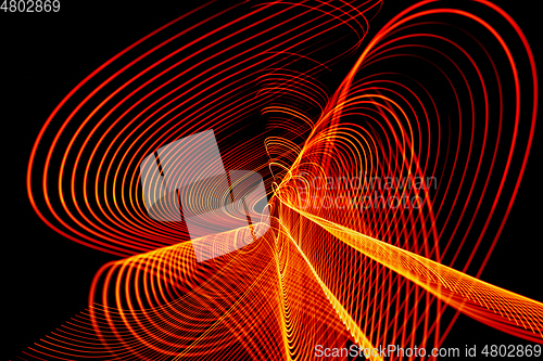 Image of Bright neon line designed background, shot with long exposure, yellow red