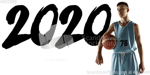 Image of Full length portrait of a young basketball player with ball, meeting 2020