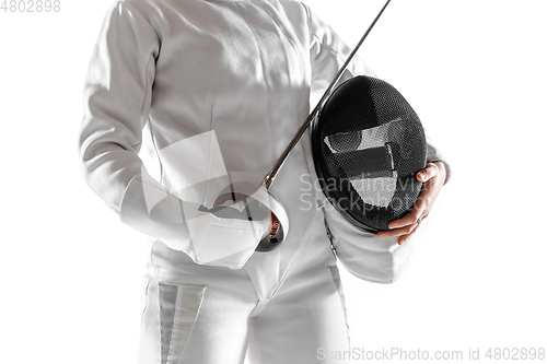 Image of Teen girl in fencing costume with sword in hand isolated on white background