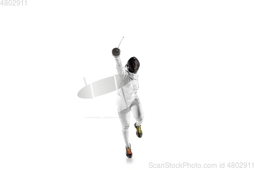 Image of Teen girl in fencing costume with sword in hand isolated on white background