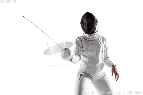 Image of Teen girl in fencing costume with sword in hand isolated on white background