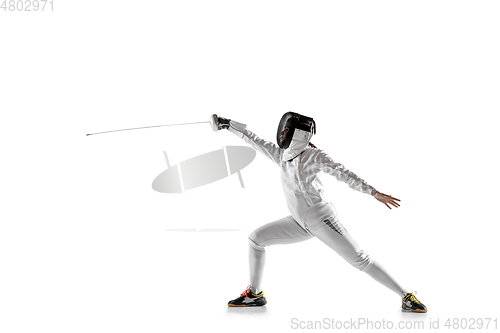 Image of Teen girl in fencing costume with sword in hand isolated on white background