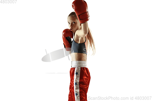 Image of Young female kickboxing fighter training isolated on white background