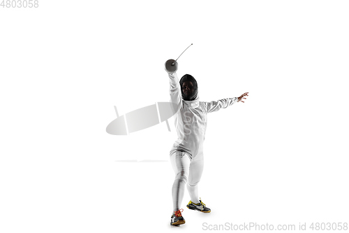 Image of Teen girl in fencing costume with sword in hand isolated on white background