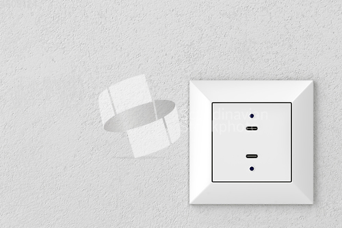 Image of Wall socket with USB-C ports
