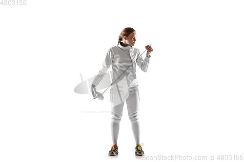 Image of Teen girl in fencing costume with sword in hand isolated on white background