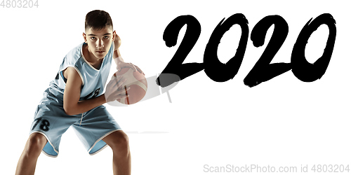 Image of Full length portrait of a young basketball player with ball, meeting 2020