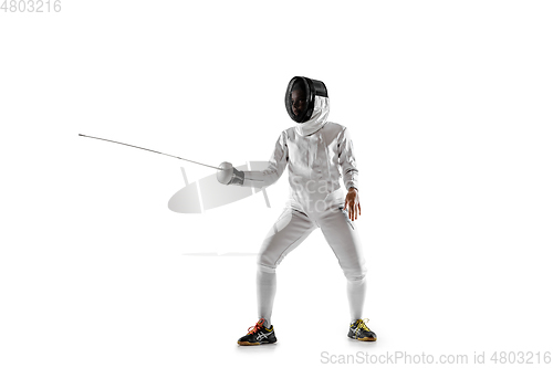 Image of Teen girl in fencing costume with sword in hand isolated on white background