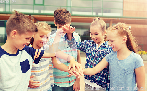 Image of group of happy elementary school students