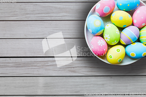 Image of close up of colored easter eggs on plate