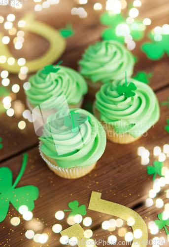 Image of green cupcakes, horseshoes and shamrock