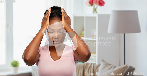 Image of african american woman suffering from headache