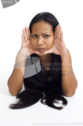 Image of young asian woman framed face