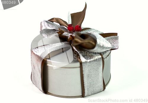 Image of metal gift box with beautiful bow