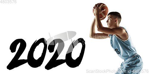Image of Full length portrait of a young basketball player with ball, meeting 2020
