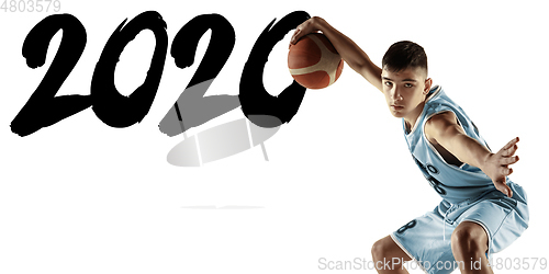 Image of Full length portrait of a young basketball player with ball, meeting 2020