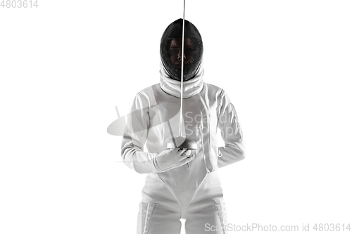 Image of Teen girl in fencing costume with sword in hand isolated on white background