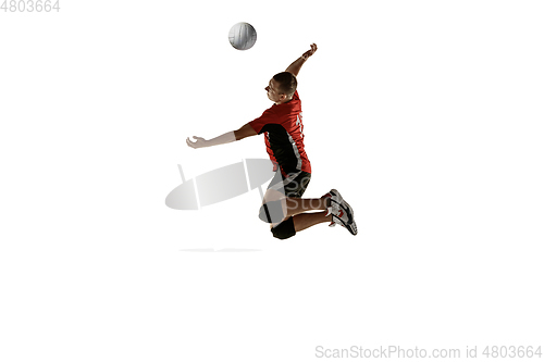 Image of Young caucasian volleyball player placticing isolated on white background