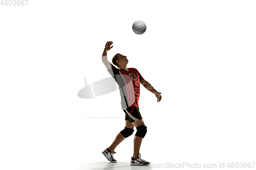 Image of Young caucasian volleyball player placticing isolated on white background