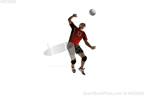 Image of Young caucasian volleyball player placticing isolated on white background