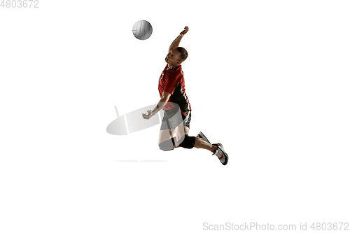 Image of Young caucasian volleyball player placticing isolated on white background