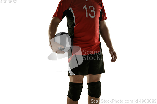 Image of Young caucasian volleyball player placticing isolated on white background