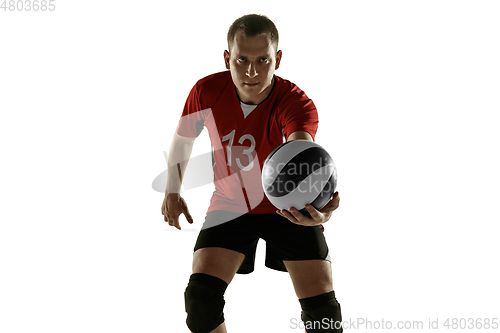 Image of Young caucasian volleyball player placticing isolated on white background