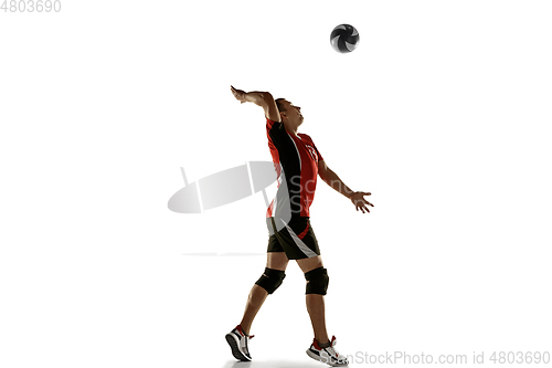 Image of Young caucasian volleyball player placticing isolated on white background